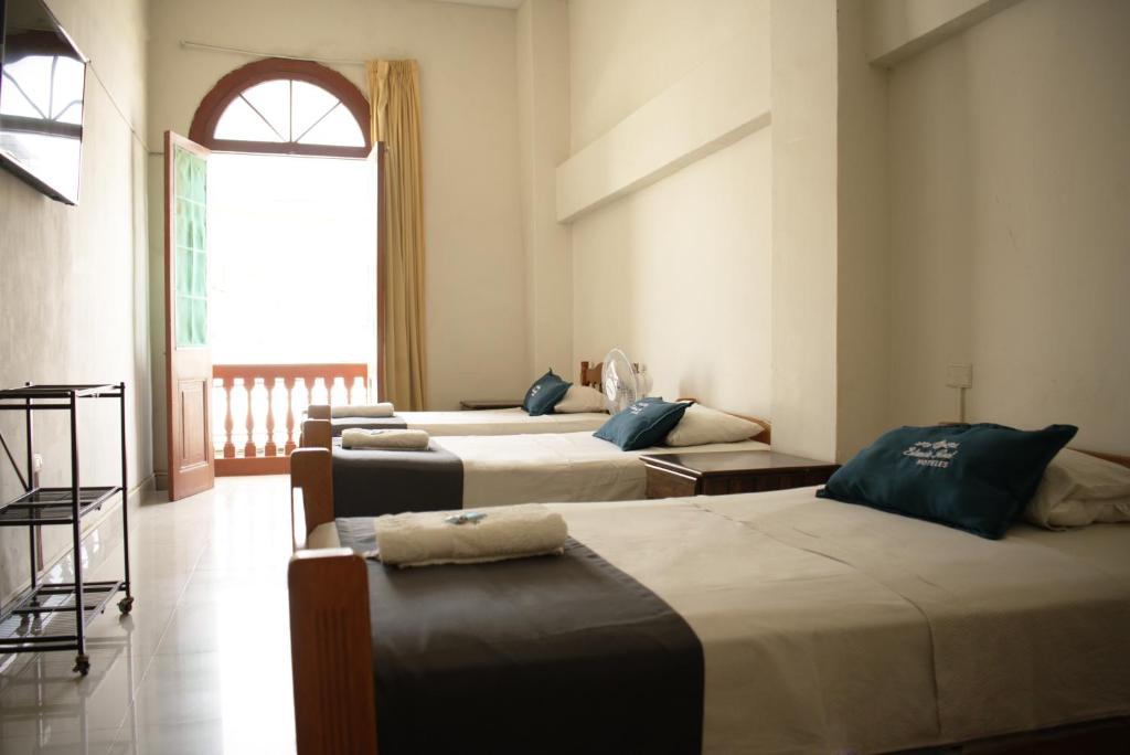 Postel nebo postele na pokoji v ubytování Hotel Estancia Real
