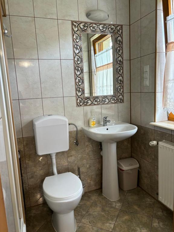 Kúpeľňa v ubytovaní Pokoje Gościnne U Gordona