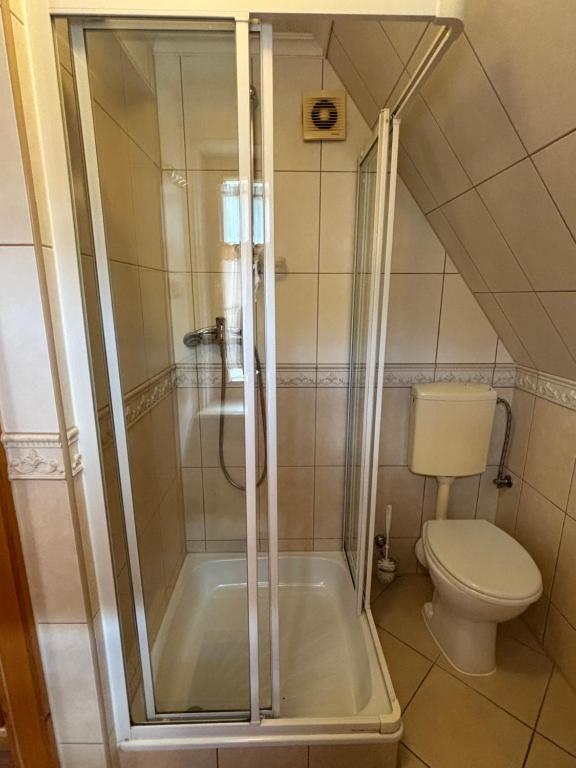 Kúpeľňa v ubytovaní Pokoje Gościnne U Gordona