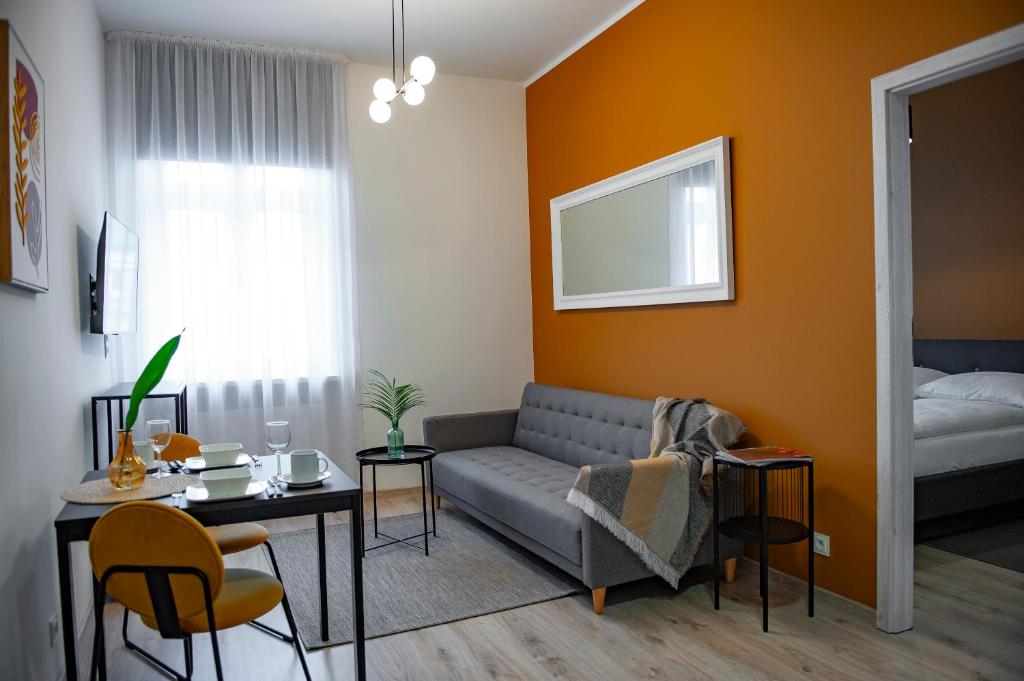 Ένα ή περισσότερα κρεβάτια σε δωμάτιο στο Apartamenty Emilia 2