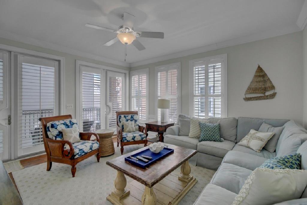a living room with a couch and chairs and a table at Boardwalk 127 by Wild Dunes, Home in Resort Core with Amenity Access in Isle of Palms