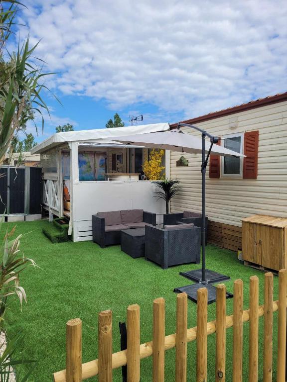 Zahrada ubytování Charmant mobil-home à 200 m des plages