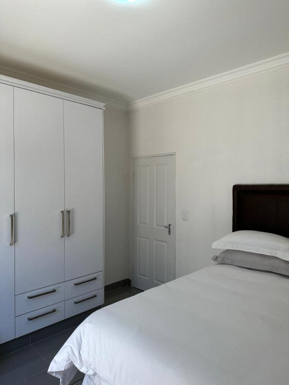 Voodi või voodid majutusasutuse Mikan AirBnB toas