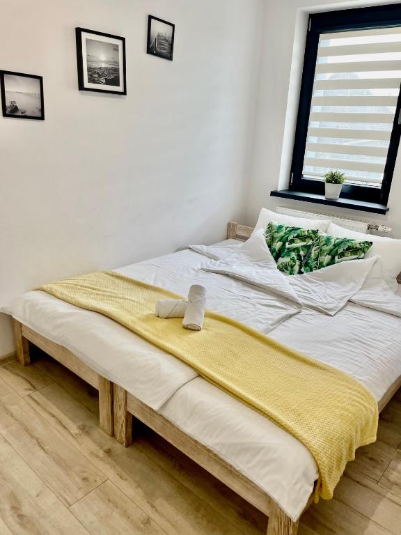 Posteľ alebo postele v izbe v ubytovaní Land House