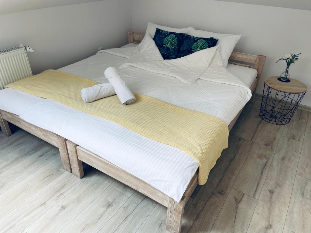 Posteľ alebo postele v izbe v ubytovaní Land House