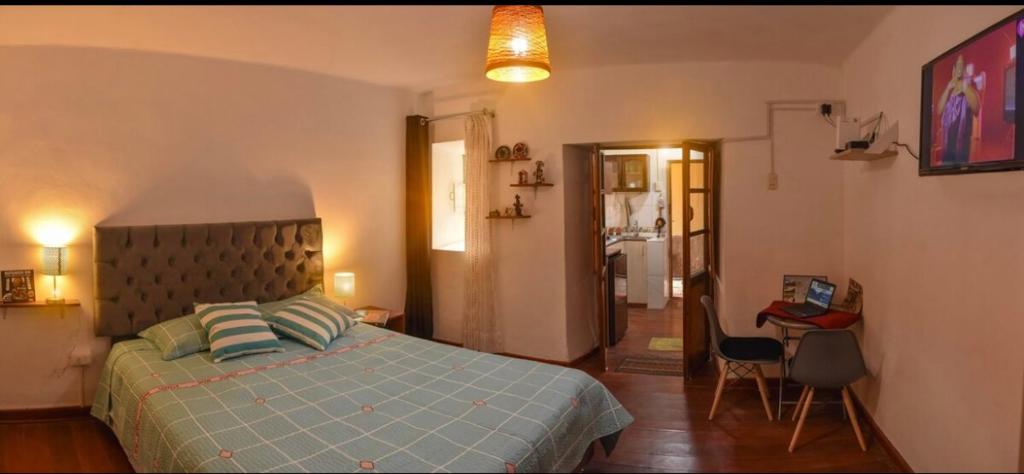 Ένα ή περισσότερα κρεβάτια σε δωμάτιο στο Apu House Minidepartamento