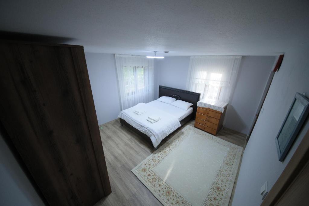Postel nebo postele na pokoji v ubytování ISABELLA Kırsal Yaşam Evi