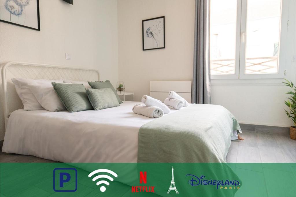 Postel nebo postele na pokoji v ubytování Fabulous Apt - Disneyland & Paris & Olympic Games