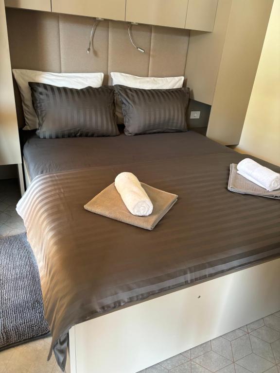 Postel nebo postele na pokoji v ubytování Ayana Mobile Home