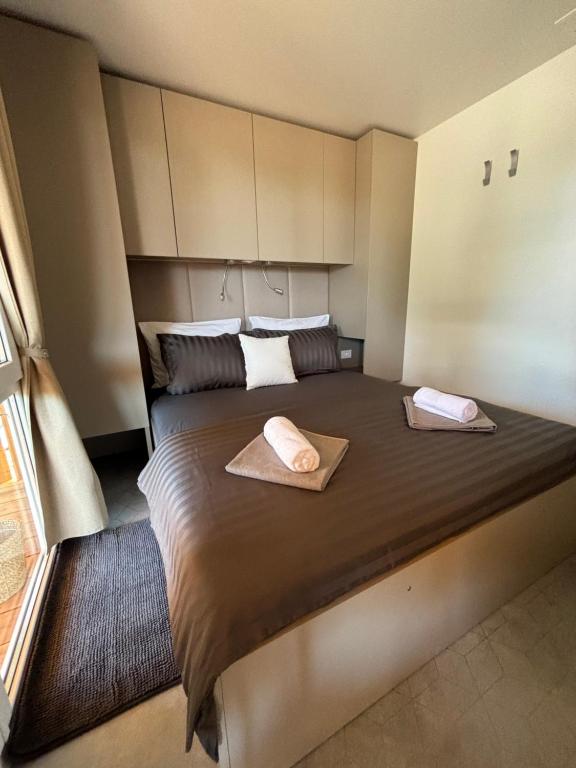 Postel nebo postele na pokoji v ubytování Ayana Mobile Home