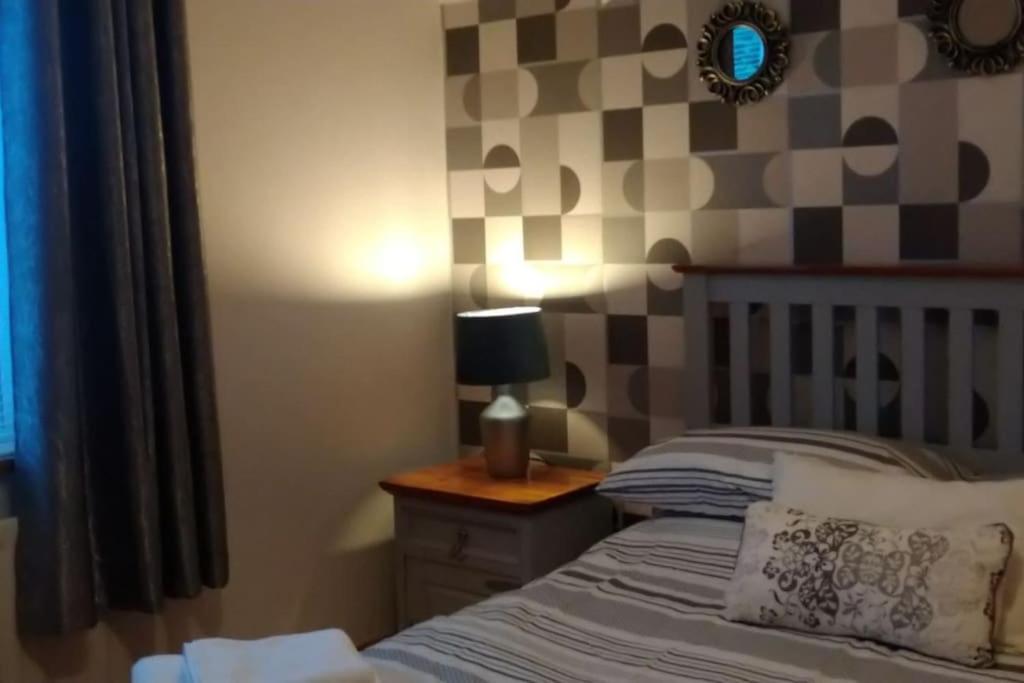 Postel nebo postele na pokoji v ubytování Moor House