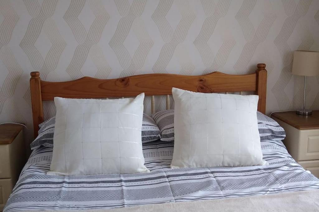 Postel nebo postele na pokoji v ubytování Moor House