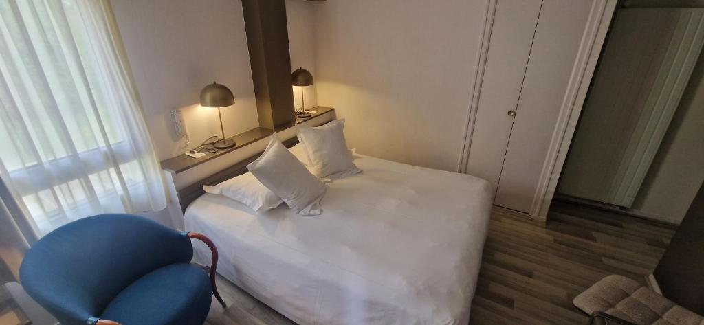 Postel nebo postele na pokoji v ubytování Beau Rivage
