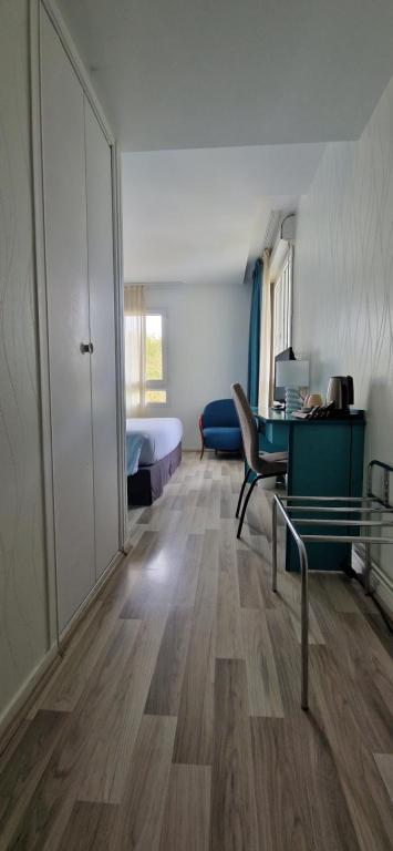 Postel nebo postele na pokoji v ubytování Beau Rivage