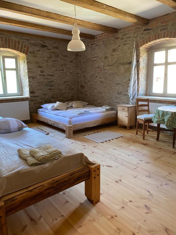 Postel nebo postele na pokoji v ubytování DOM PIWOWARA