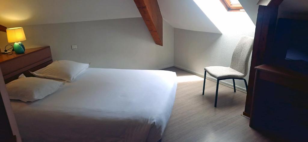 Postel nebo postele na pokoji v ubytování Beau Rivage