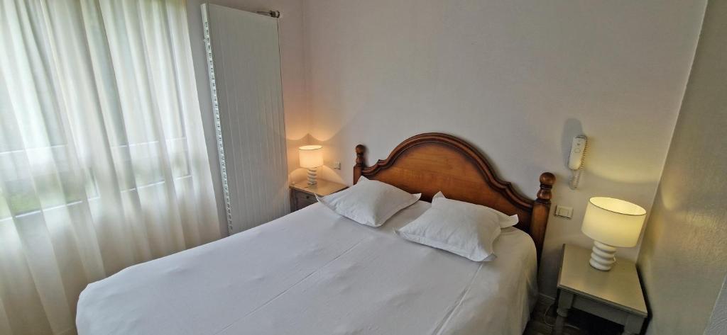 Postel nebo postele na pokoji v ubytování Beau Rivage