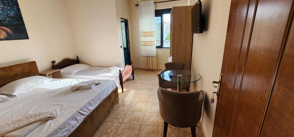 Postel nebo postele na pokoji v ubytování Hotel La Villa
