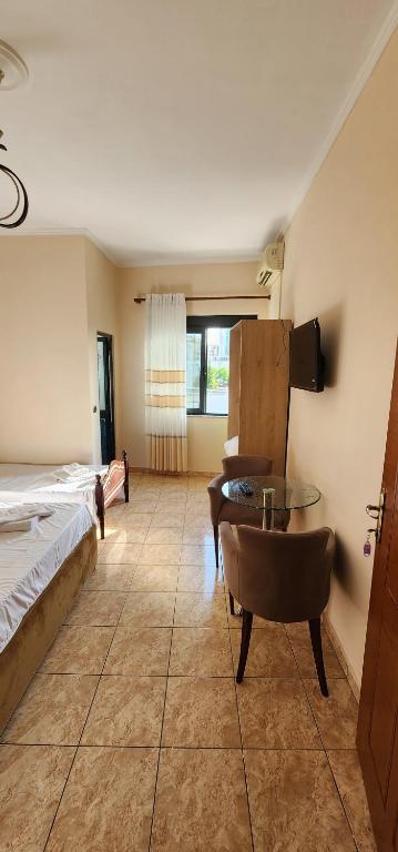 Postel nebo postele na pokoji v ubytování Hotel La Villa