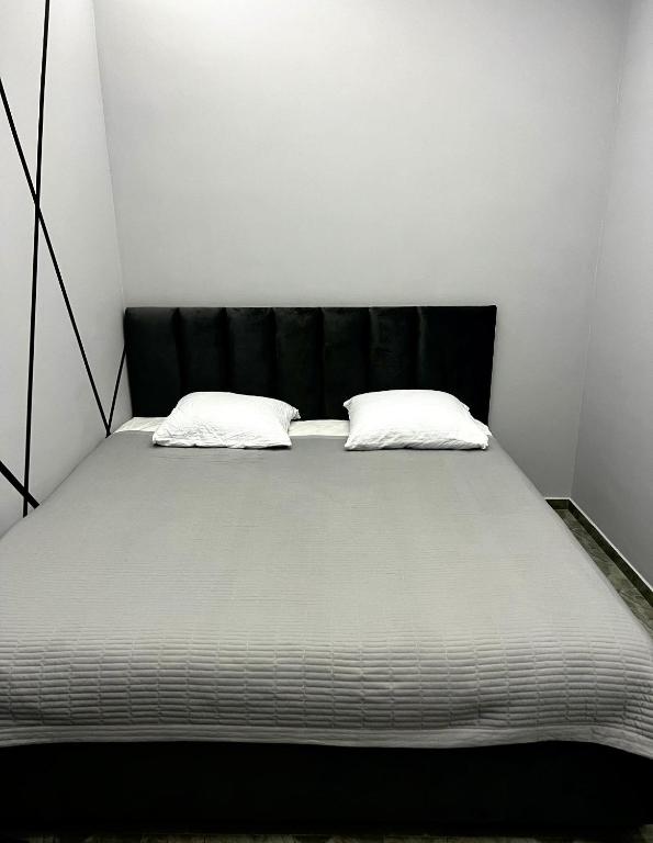 Postel nebo postele na pokoji v ubytování Lumi
