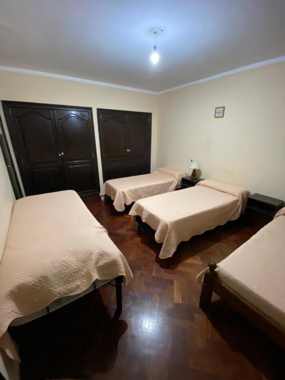 Postel nebo postele na pokoji v ubytování COYA HOSTEL
