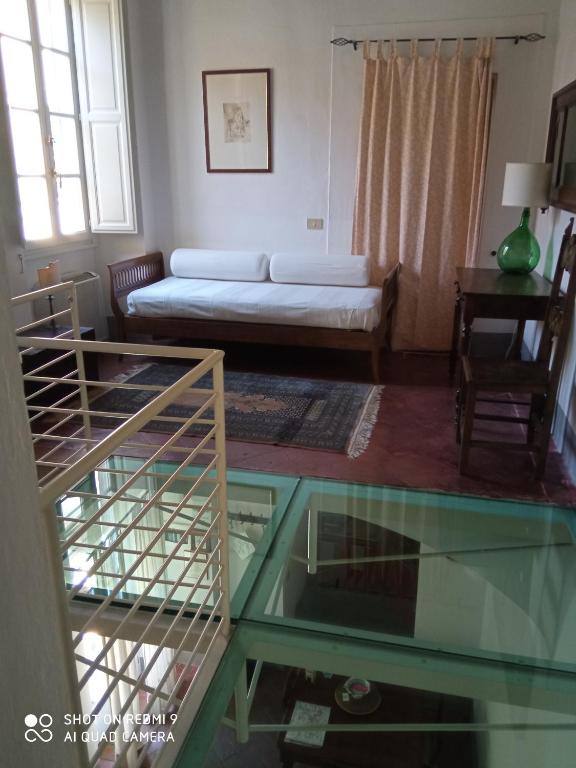 Posteľ alebo postele v izbe v ubytovaní Relais Sassetti