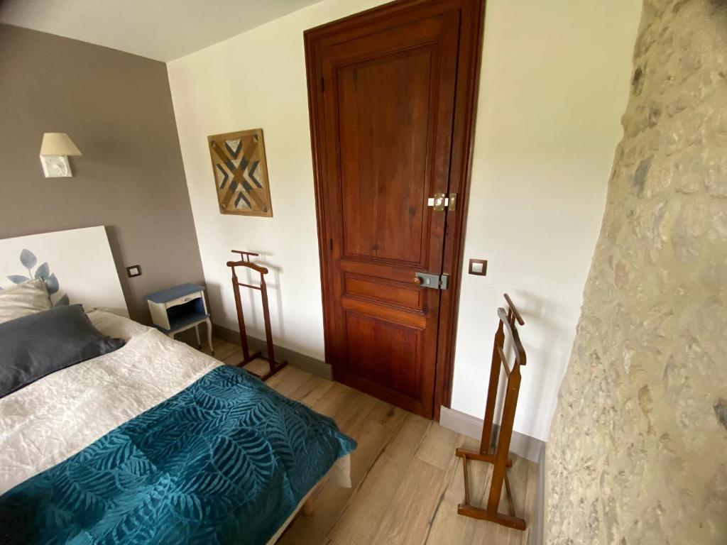 Postel nebo postele na pokoji v ubytování La Villa Mirabelle 2min d'Arromanches-les-Bains
