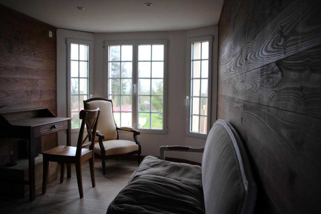 Posezení v ubytování La Villa Mirabelle 2min d'Arromanches-les-Bains