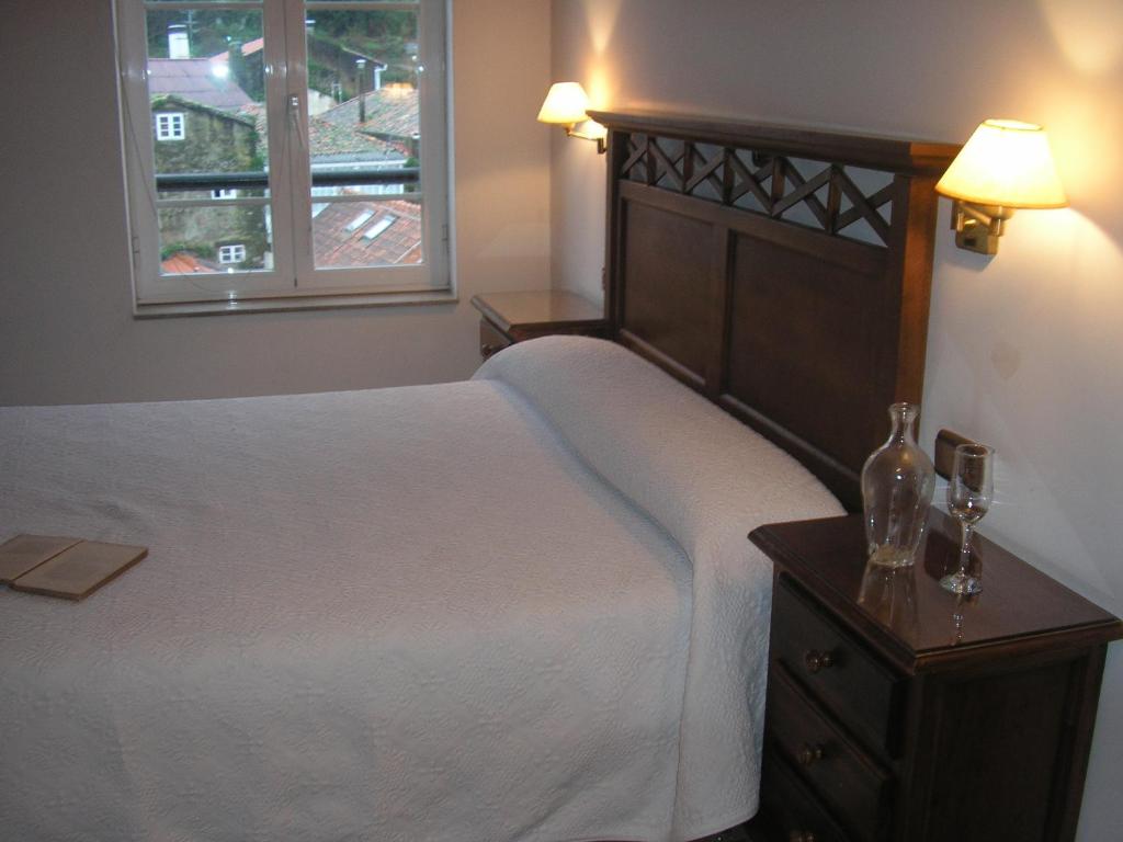 Cama o camas de una habitación en Pension Residencia Ria De Muros