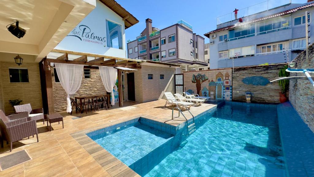 Swimming pool sa o malapit sa Hotel das Palmas