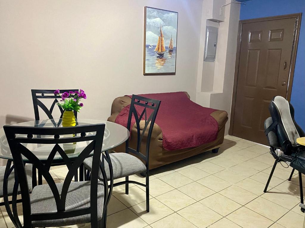 Merendon Suite Apartamento的休息区
