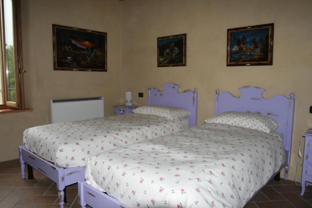 Posteľ alebo postele v izbe v ubytovaní SacreTerre B&B e Agriturismo