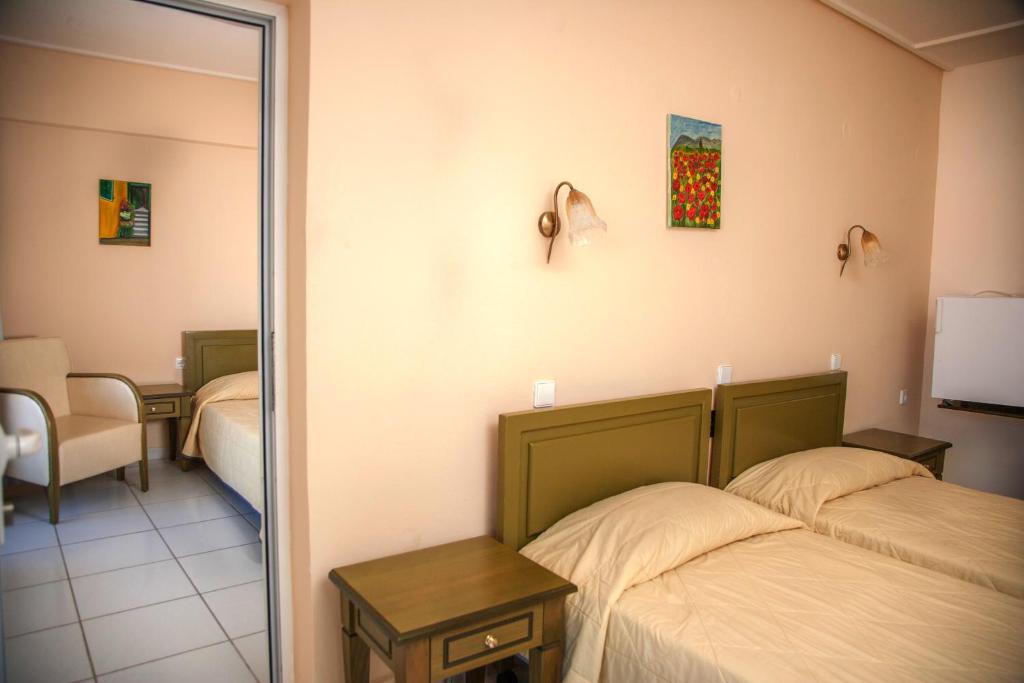 Postel nebo postele na pokoji v ubytování Hotel Niras