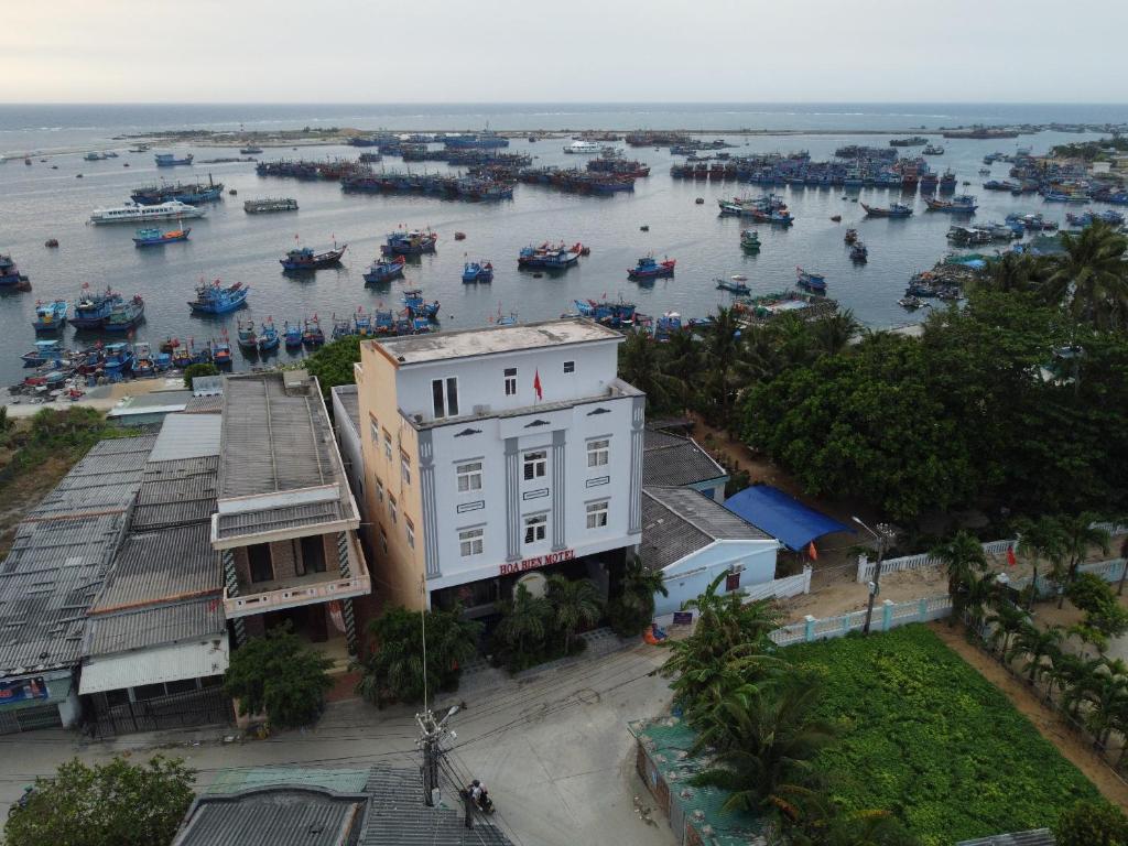 an aerial view of a harbor with boats in the water at Hoa Bien Motel in Ly Son