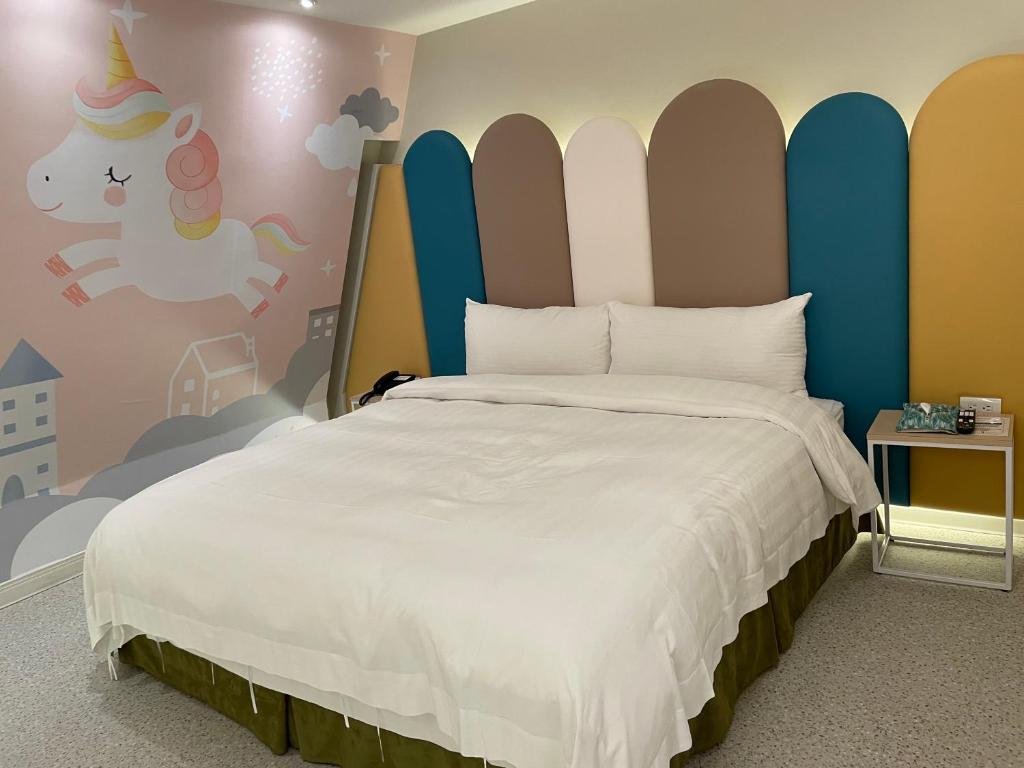 Postel nebo postele na pokoji v ubytování Ya Nold Hot Spring Hotel