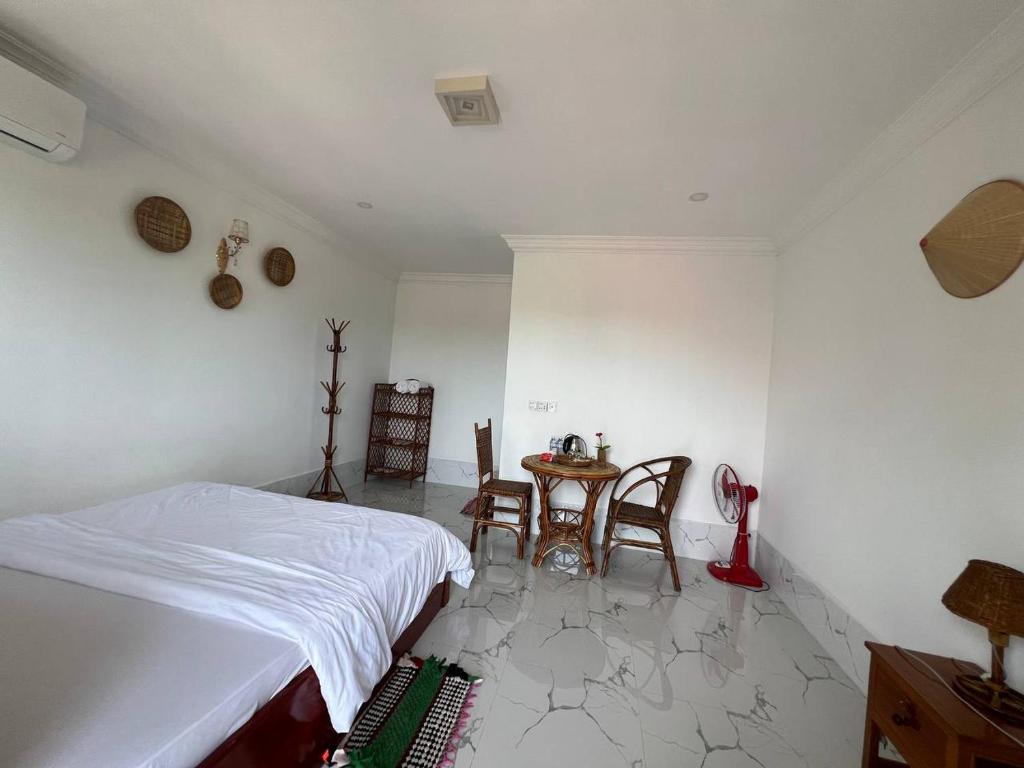 Postel nebo postele na pokoji v ubytování El Ling guesthouse