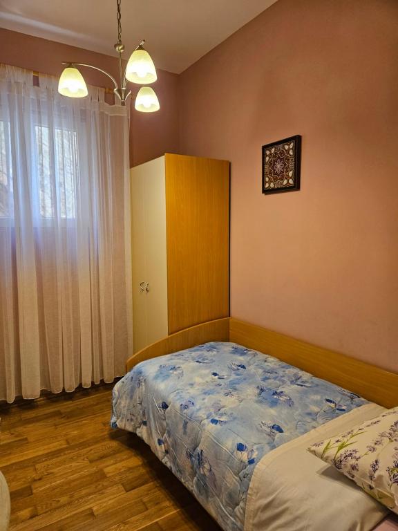 Postel nebo postele na pokoji v ubytování Villa Kety