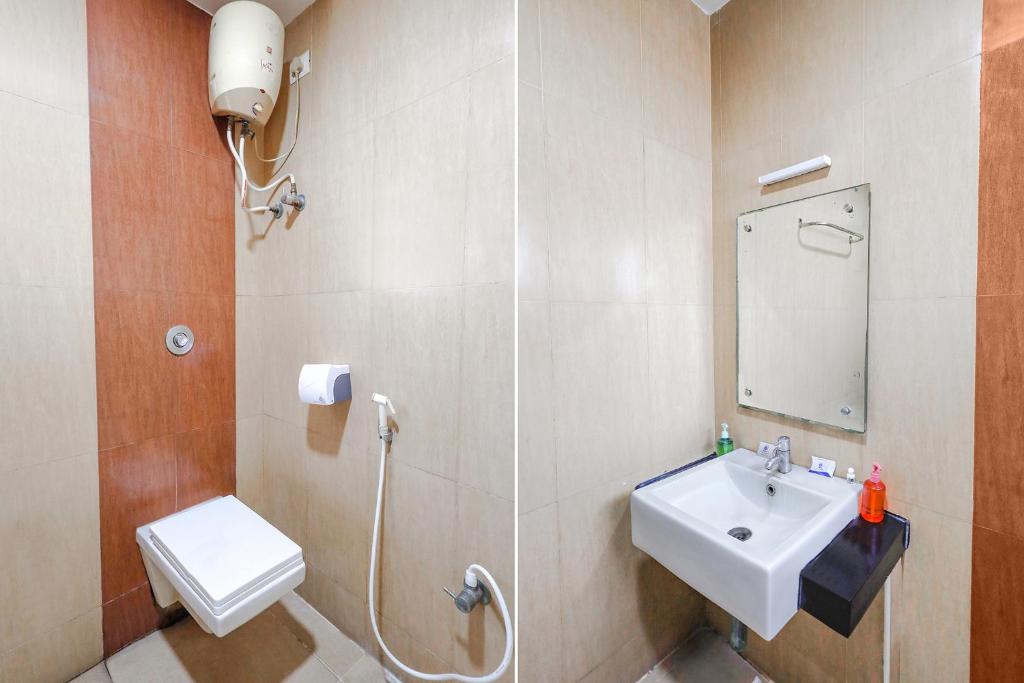 Koupelna v ubytování Fabhotel Prime Mahalaya Residency - Nr Pallavaram Railway Station