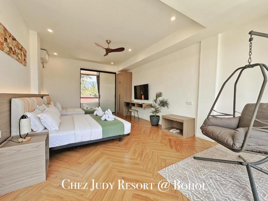 Postel nebo postele na pokoji v ubytování Chez Judy Resort