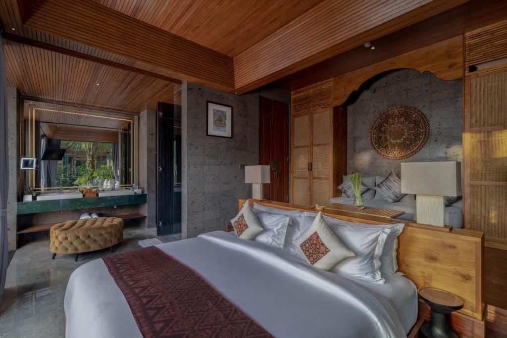 Postel nebo postele na pokoji v ubytování Gdas Bali Health and Wellness Resort - Adult Only