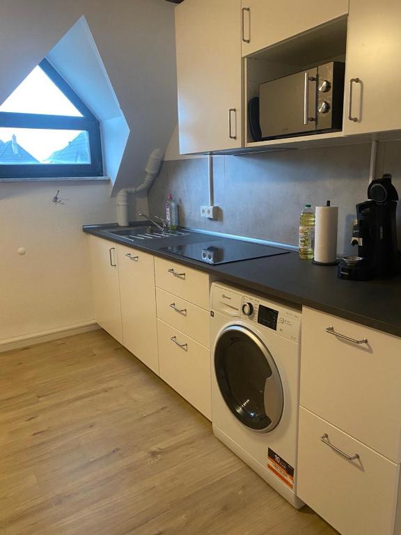 Kuchyň nebo kuchyňský kout v ubytování Charmante Wohnungen direkt in der Stadtmitte