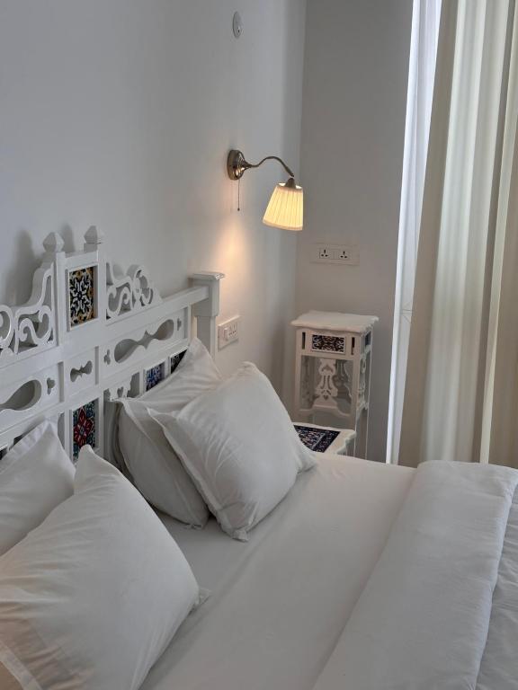 Postel nebo postele na pokoji v ubytování Oceanic - Luxury Boutique Hotel