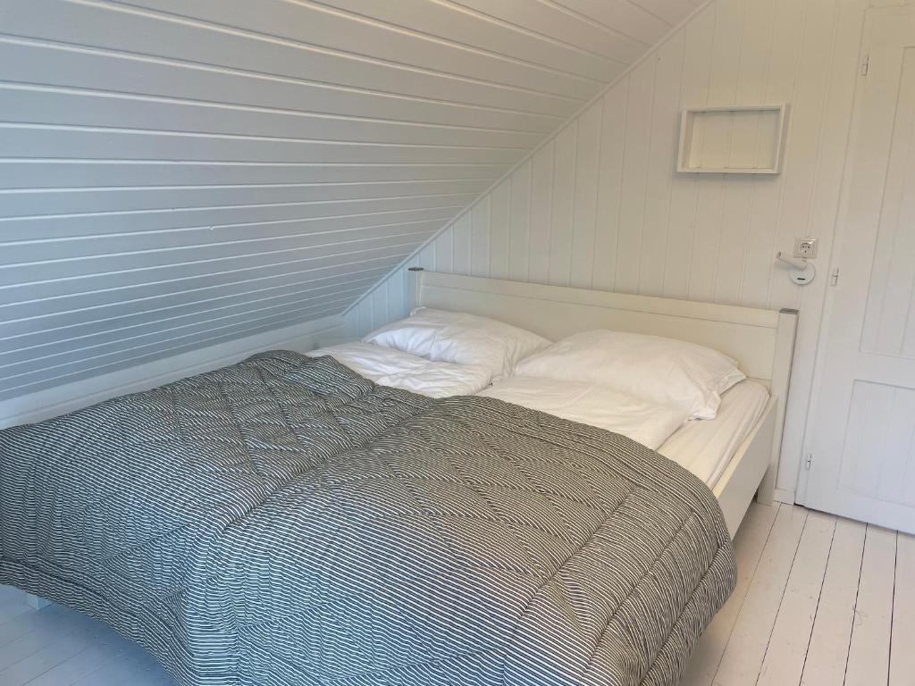 Postel nebo postele na pokoji v ubytování Ferienhaus am Hafen Zingst
