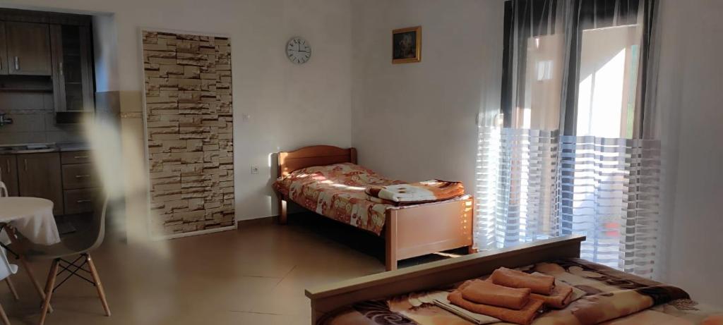 Postel nebo postele na pokoji v ubytování Village house - Novak Rijecani