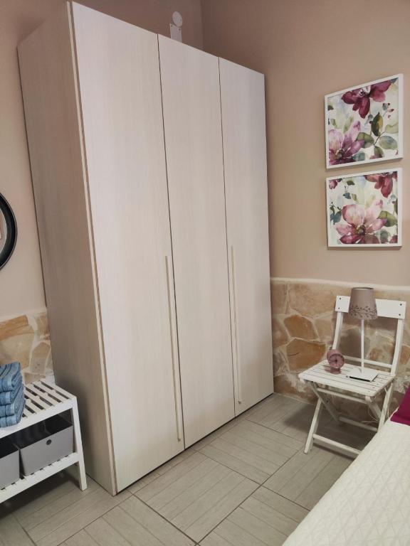 Łóżko lub łóżka w pokoju w obiekcie Villetta indipendente - zona Vaccarizzo