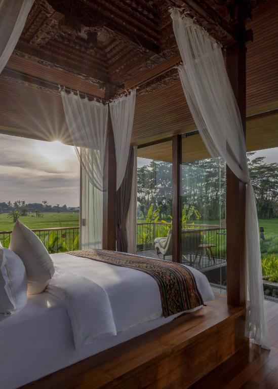 Postel nebo postele na pokoji v ubytování Gdas Bali Health and Wellness Resort - Adult Only