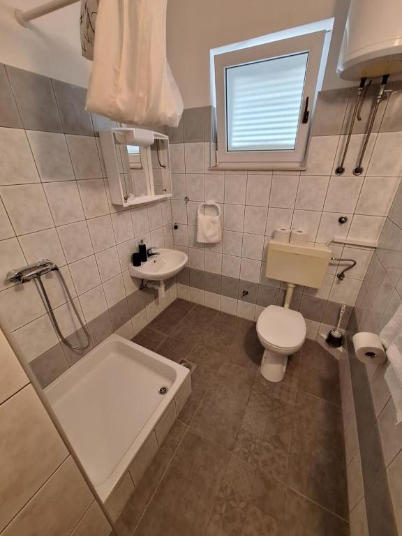 Koupelna v ubytování Anic Apartments Stanići