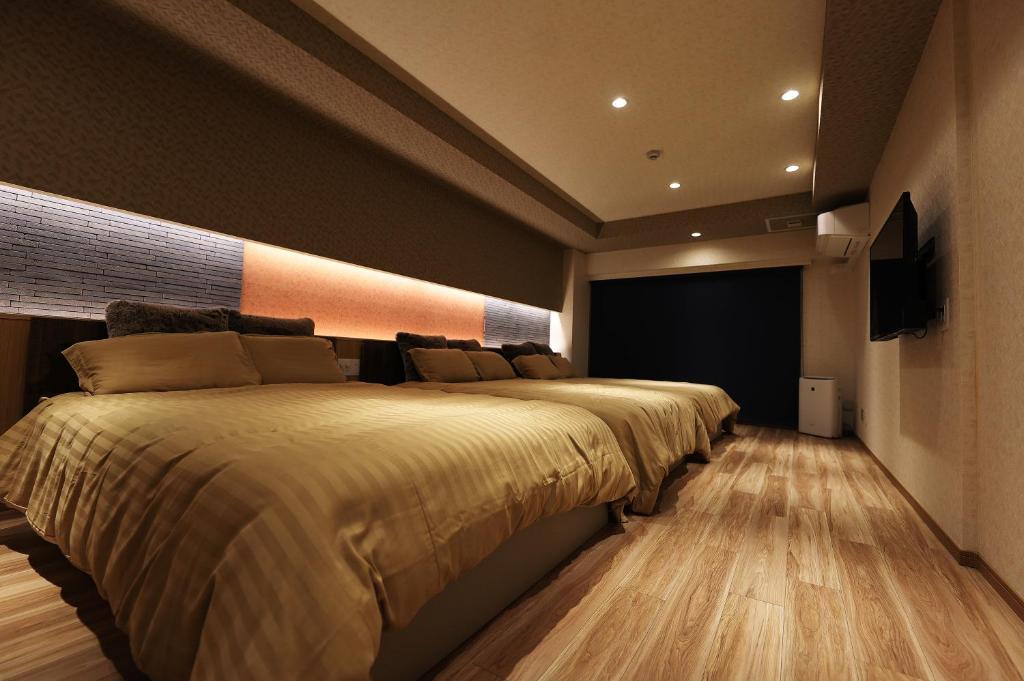 Postel nebo postele na pokoji v ubytování MolinHotels702 アクティビティを満喫できる札幌定山渓 天然温泉付-1L2Room K-Bed1&W-beds3 8persons