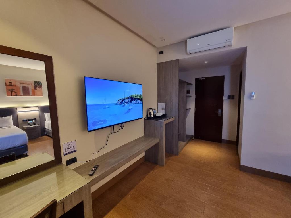 TV a/nebo společenská místnost v ubytování Altori Park Hotel