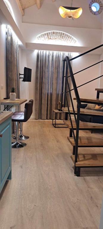 TV a/nebo společenská místnost v ubytování Center Corfu Studios